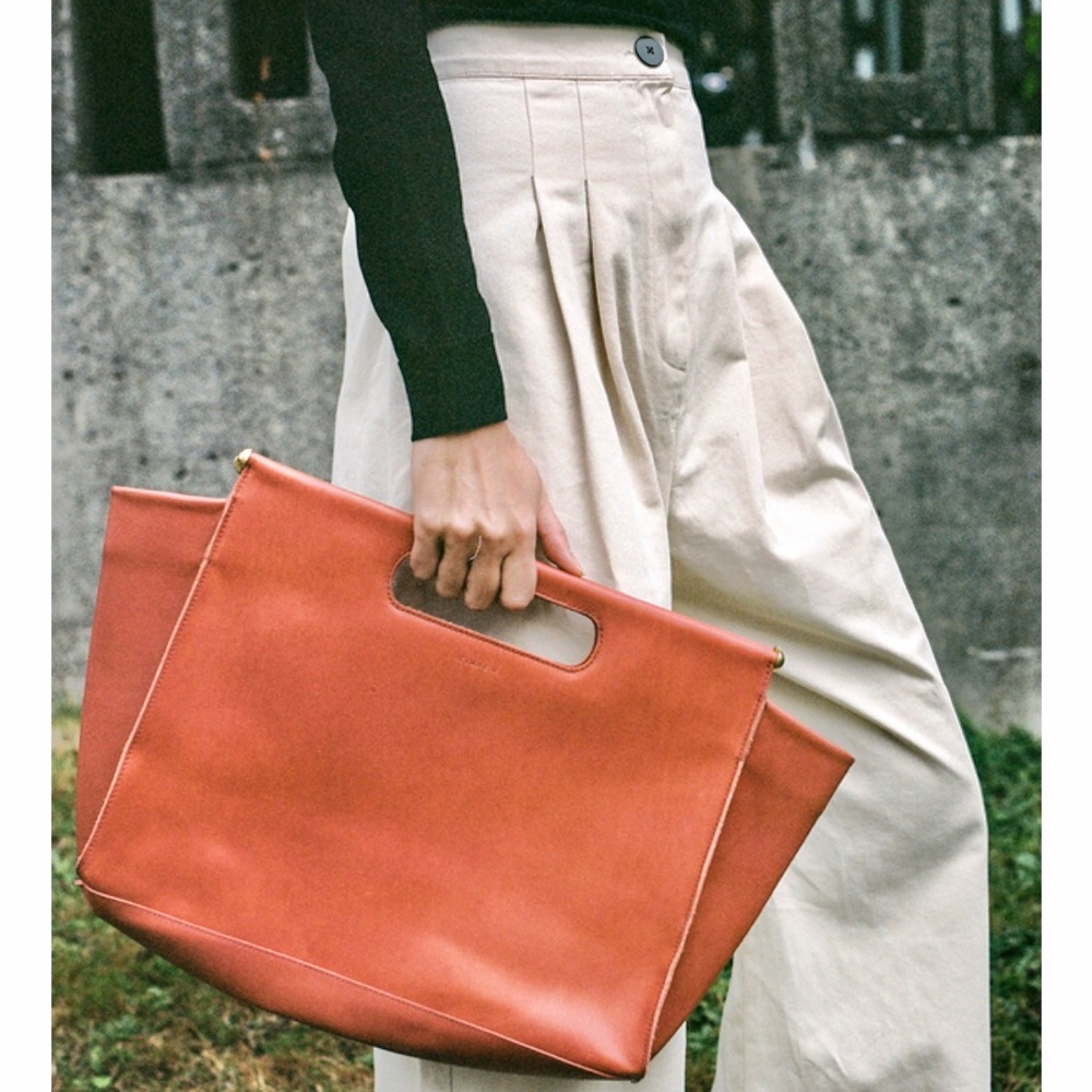Clare V. “Maude” top handle leather bag